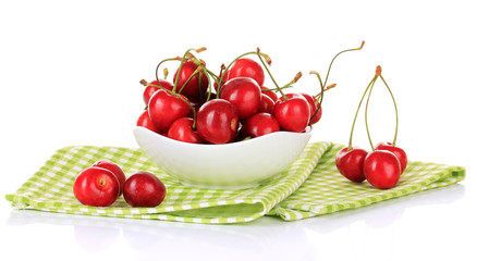 Cherry berries in bowl isolated on white