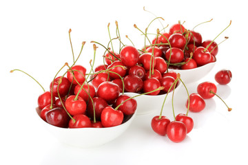 Naklejka na ściany i meble Cherry berries in bowl isolated on white
