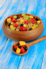 Oatmeal with fruits on table close-up