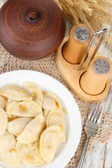 Tasty dumplings with fried onion