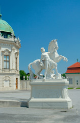 Fototapeta na wymiar Sculpture of a man with horse near Upper Belvedere, Vienna, Aust