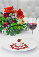 panacotta dessert with ripe raspberries,