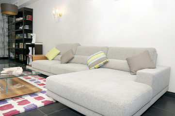 large living room with comfortable sofas and furniture