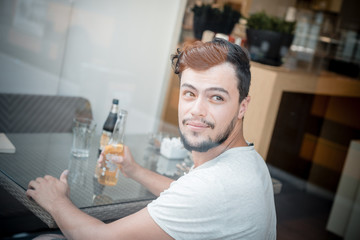young stylish man at the bar