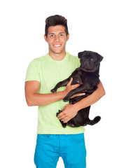 Attractive boy with her pug dog