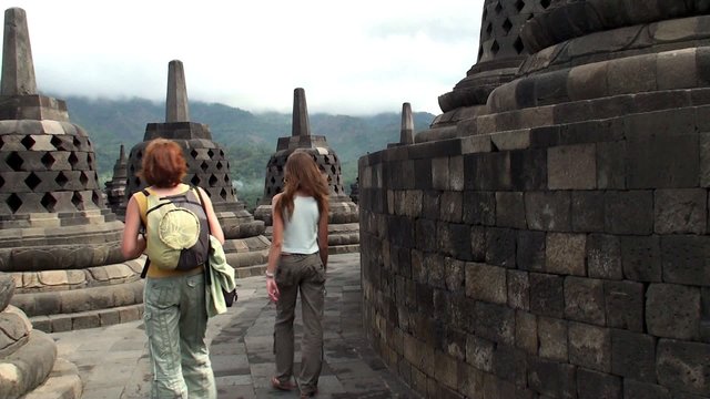 Tourists in Borobudur. Buddhist Temple, Java, Indonesia.