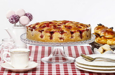 Strawberry pie on cake stand, white background, copy space