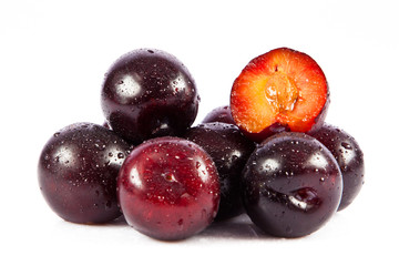 plums isolated on white background