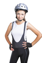 portrait of a beautiful brunette sportswoman standing against pu