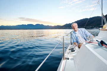 Fototapeta premium happy sailing man boat