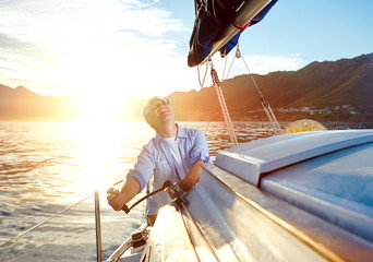 sunrise sailing boat