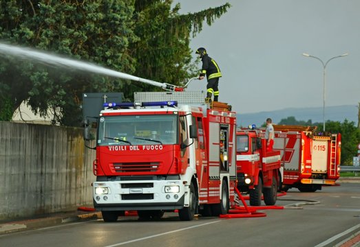 firefighters with the fire truck when switching off a fire