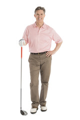 Portrait Of Confident Man With Golf Club