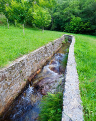 Fototapeta na wymiar Water canal in nature