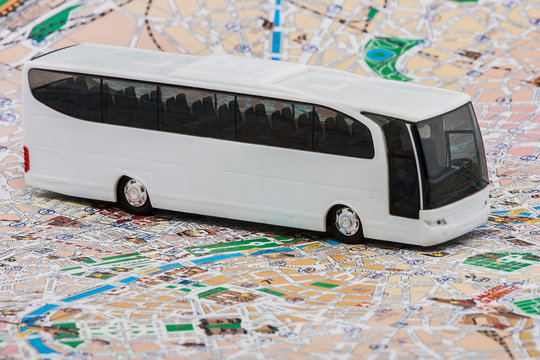 Mini bus on travel map background