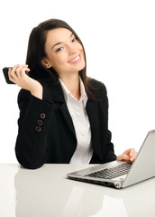 Beautiful business woman enjoying technology at office