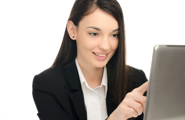 Beautiful business woman using a tablet at work