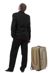 Back view of traveling busness man with  suitcase