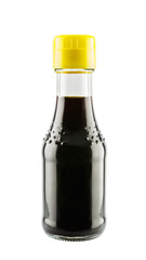 Soy sauce in glass bottle isolated on white background