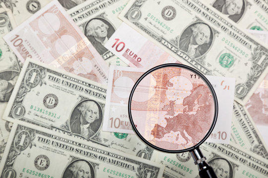 Focusing on Euro banknote against US and Euro currencies