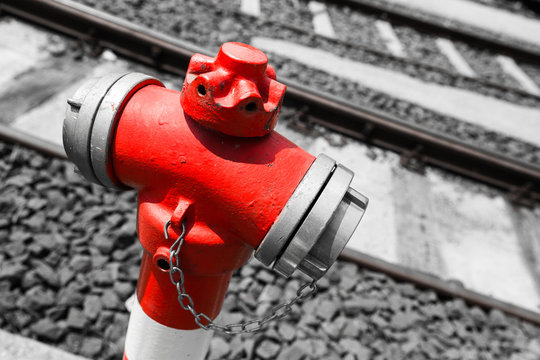 Typical red fire hydrant details along the tram rails