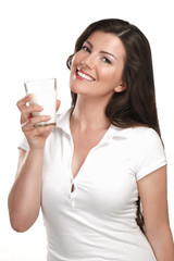young beautiful woman drink a glass of milk - 54082734