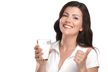 young beautiful woman drink a glass of milk - 54082793