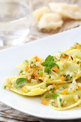 Italian ravioli or tortellini with vegetable sause