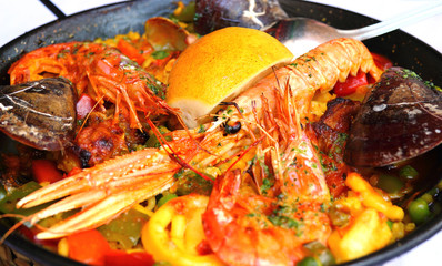 Spanish paella with seafood in a pan