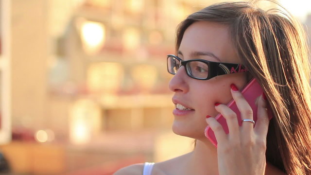 Pretty young woman using mobile phone - Smartphone