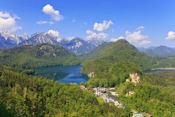 Naklejka na ściany i meble Landscape of Bavarian Alps in Germany and Hohenschwangau Castle