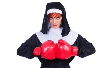 Nun with boxing gloves isolated on white