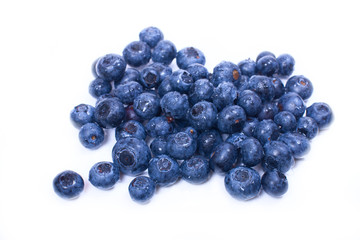 Juicy blueberries on a white background