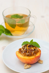 Peach dessert and cup of tea