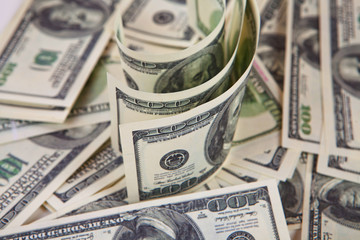 One hundred dollars pile
