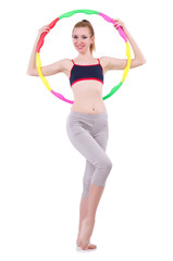 Woman doing exercises with hula hoop