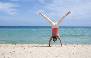 Cartwheel on the beach in Sardinia