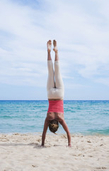 Handstand on the beach in Sardinia