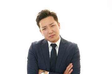 困惑するビジネスマン