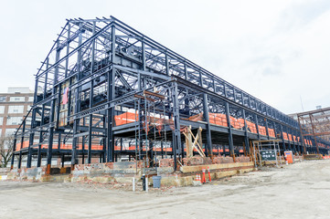 Empty warehouse/factory shell under construction.
