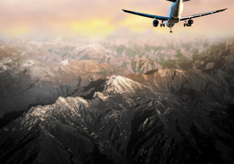 Aircraft in mountain landscape - Powered by Adobe