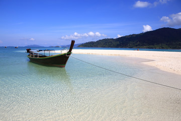 Fototapeta na wymiar Clear water and blue sky. Lipe island, Thailand