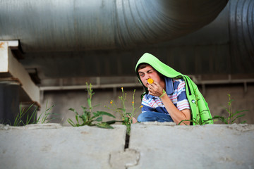 Crazy young man with a flower