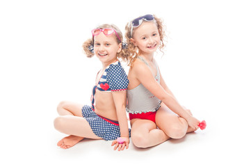 Two young and beautiful girls in bathing suits