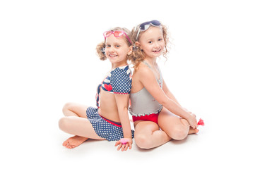 Two young and beautiful girls in bathing suits