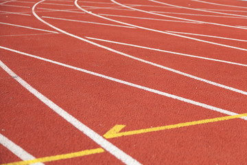 Fototapeta premium bright treadmill with turns in the stadium