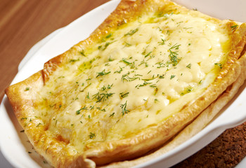 Qutab -baked  lavash cheese pie