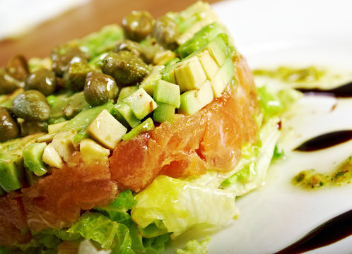 Salad with salmon with sauce.closeup
