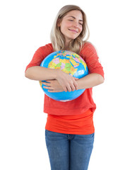 Woman embracing a globe