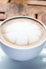 Microfoam of milk topped on hot cafe mocha